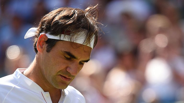 Switzerland's Roger Federer reacts against South Africa's Kevin Anderson during their men's singles quarter-finals match on the ninth day of the 2018 Wimbledon Championships at The All England Lawn Tennis Club in Wimbledon, southwest London, on July 11, 2018.