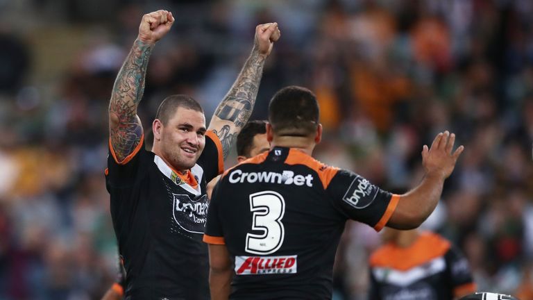 Russell Packer of the Tigers celebrates victory with team mates at the end of the round 19 NRL match between the Wests Tigers and the South Sydney Rabbitohs at ANZ Stadium on July 21, 2018 in Sydney, Australia.