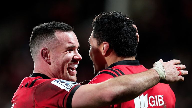 Ryan Crotty (L) of the Crusaders celebrates with his team mate Pete Samu (R) after the Super Rugby Qualifying Final match between the Crusaders and the Sharks at AMI Stadium on July 21, 2018 in Christchurch, New Zealand.