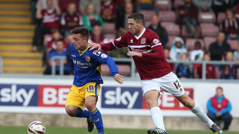 Ryan Williams and Ben Tozer during the Sky Bet League Two match between Northampton Town and Morecambe at Sixfields Stadium on September 28, 2013 in Northampton, England.