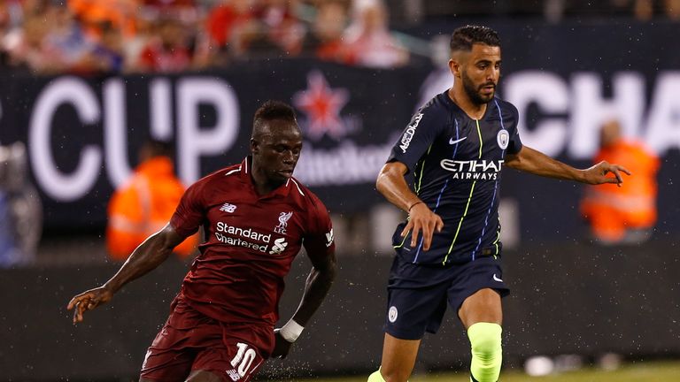 EAST RUTHERFORD, NJ - JULY 25: Phil Foden #47 of Manchester City fights for the ball with Sadio Mane #10 of Liverpool during their match at MetLife Stadium on July 25, 2018 in East Rutherford, New Jersey. (Photo by Jeff Zelevansky/Getty Images)