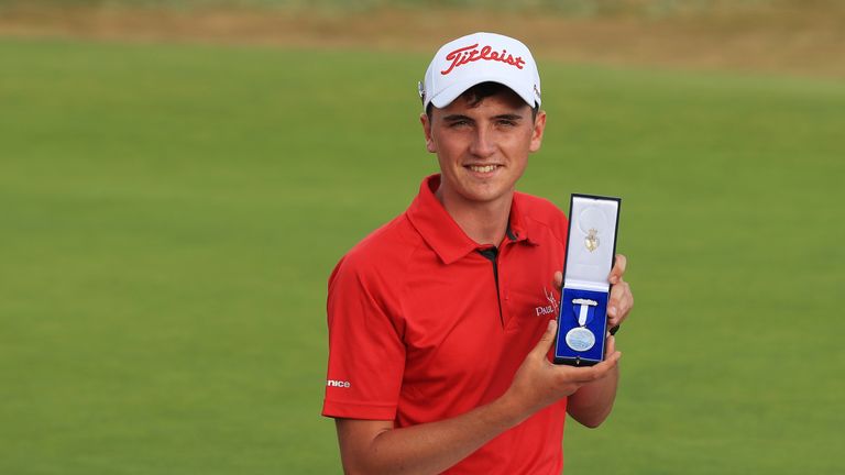 Sam Locke proudly displays his Silver Medal after finishing as the leading amateur at The Open at Carnoustie