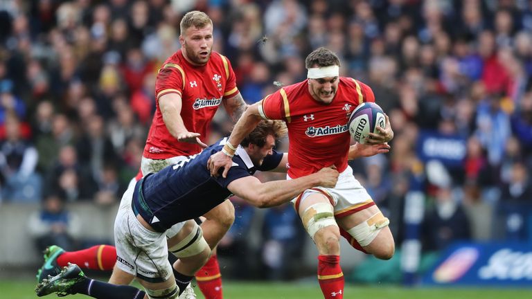 Sam Warburton is tackled by Richie Gray during the RBS Six Nations match between Scotland and Wales at Murrayfield Stadium on February 25, 2017
