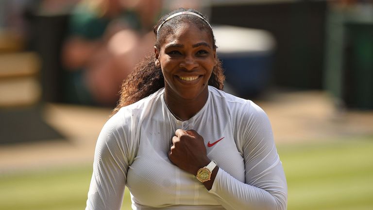 Serena Williams celebrates after beating Germany's Julia Goerges 6-2, 6-4 in their women's singles semi-final match on the tenth day of the 2018 Wimbledon Championships at The All England Lawn Tennis Club in Wimbledon, southwest London, on July 12, 2018. 