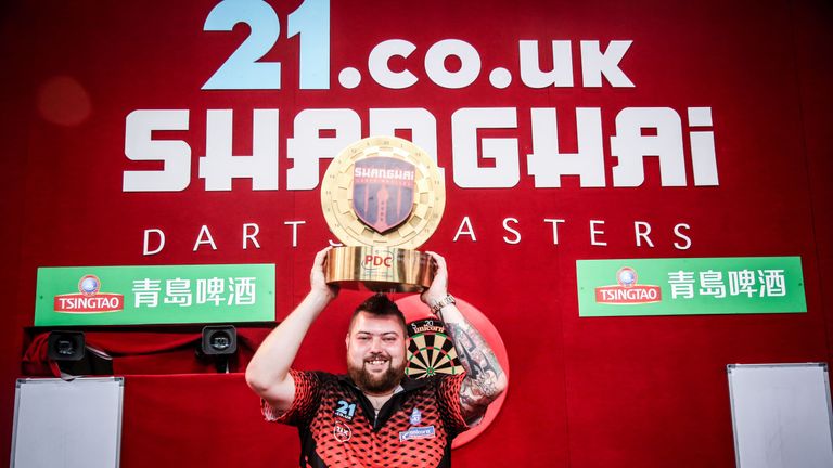 Michael Smith celebrates after his victory in Shanghai - Credit: Henry Yu – YouSports/PDC