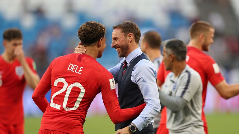 Dele Alli and Gareth Southgate celebrate England's win