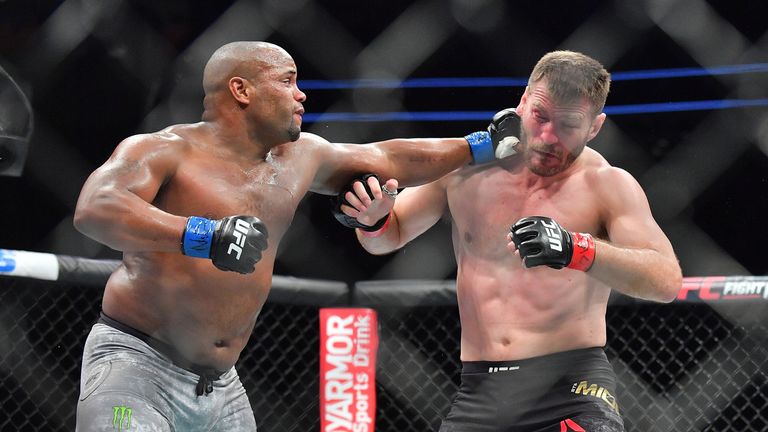 Daniel Cormier lands a punch on Stipe Miocic