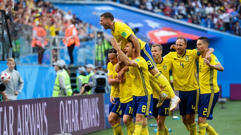 Sweden's players celebrate after Emil Forsberg gives them a 1-0 lead