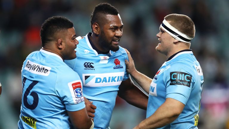 Taqele Naiyaravoro of the Waratahs celebrates with his team mate Silatolu Latu and Tom Robertson of the Waratahs after scoring a try during the round 18 Super Rugby match between the Waratahs and the Sunwolves at Allianz Stadium on July 7, 2018 in Sydney,