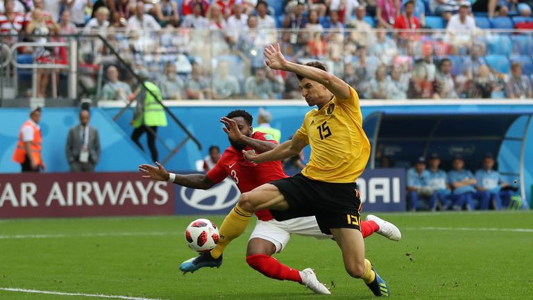 Thomas Meunier beats Danny Rose to the ball to put Belgium ahead