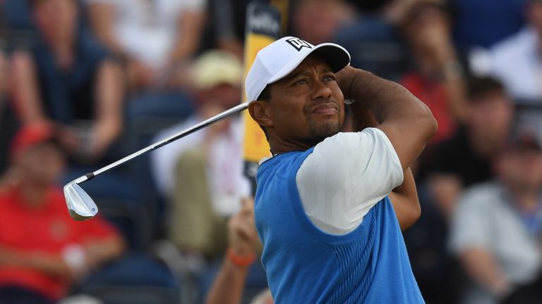 Tiger Woods opened with a level-par 71 at Carnoustie