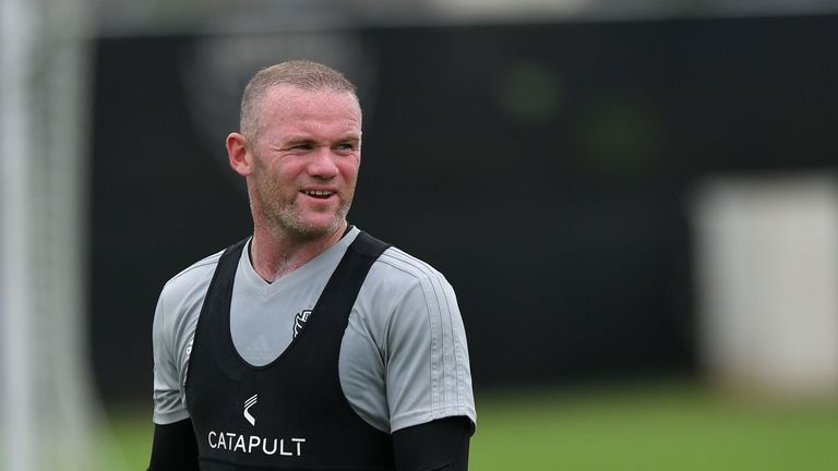 Wayne Rooney takes part in a training session at the Robert F. Kennedy Memorial Stadium training field in Washington, DC 