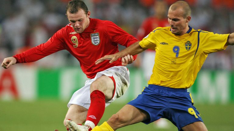 Wayne Rooney and Freddie Ljungberg compete for the ball as England play Sweden at the 2006 World Cup