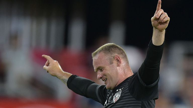 Wayne Rooney celebrates a DC United goal against Vancouver Whitecaps