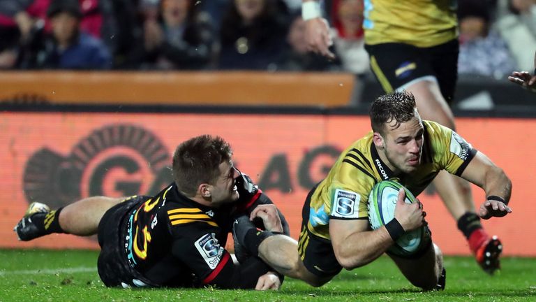 Hurricanes' Wes Goosen dives over for a try against the Chiefs