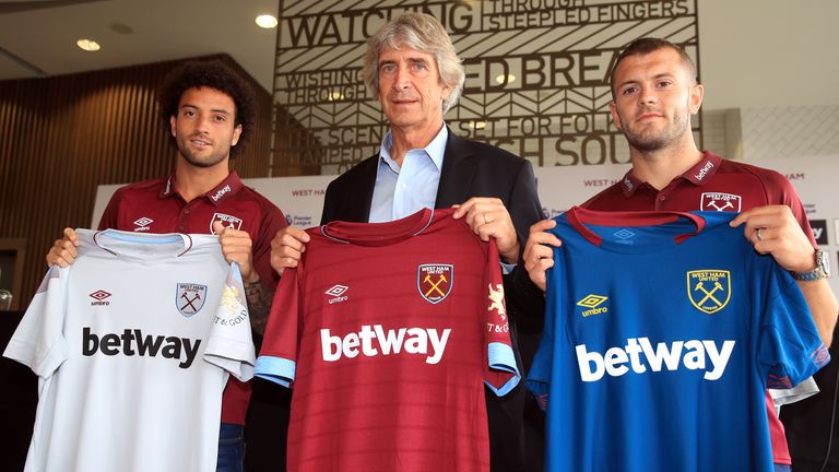 West Ham manager Manuel Pellegrini (centre) with Felipe Anderson (left) and Jack Wilshere during a press conference at the London Stadium, London