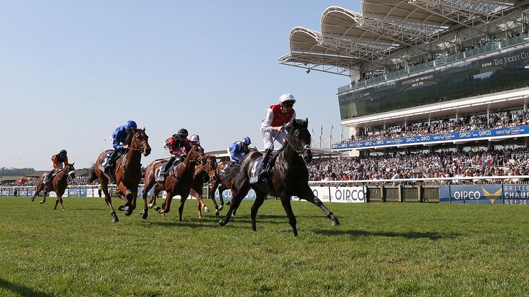 Konchek ridden by jockey Adam Kirby coming home to win the Havana Gold Maiden Stakes during day two of the QIPCO Guineas Festival at Newmarket Racecourse.