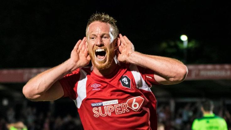 Adam Rooney celebrates his brace against Halifax