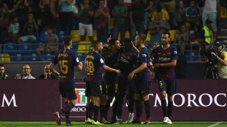 Ousmane Dembele is mobbed by team-mates after putting Barcelona 2-1 ahead