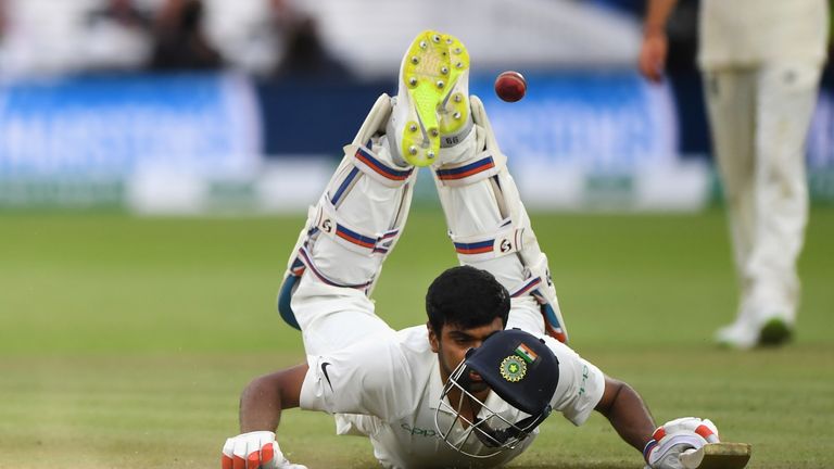LONDON, ENGLAND - AUGUST 12:  England wicketkeeper Jonny Bairstow reacts as India batsman Ravi Ashwin looses his helmet as dives to make his ground during day 4 of the Second Test Match between England and India at Lord's Cricket Ground on August 12, 2018 in London, England.  (Photo by Stu Forster/Getty Images)