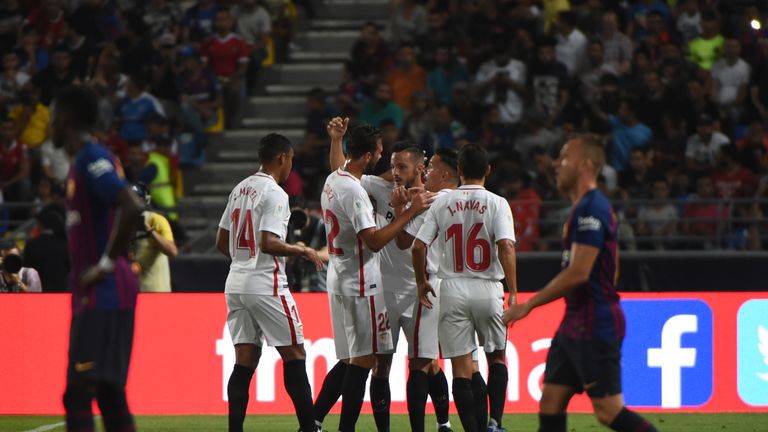 Sevilla celebrate Pablo Sarabia's opening goal