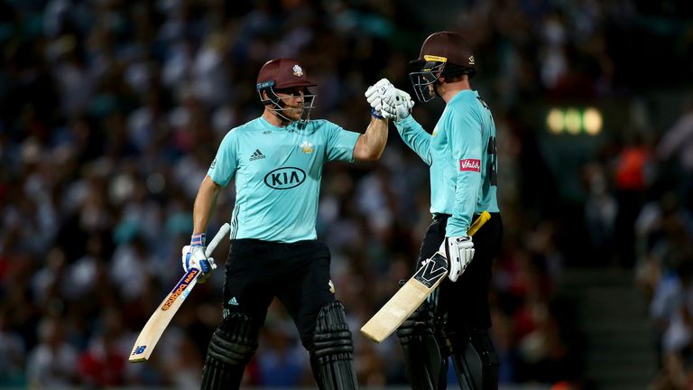 Aaron Finch and Jason Roy punch fists during Surrey&#39;s win over Middlesex