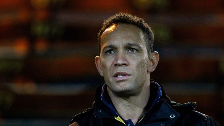 Head coach Adrian Lam of Papua New Guinea watches on before the Rugby League World Cup Group B match between New Zealand and Papua New Guinea at Headingley Stadium on November 8, 2013 in Leeds, England