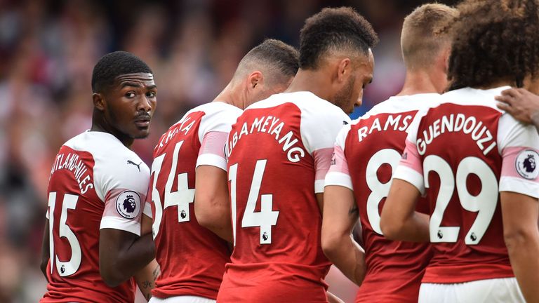 Ainsley Maitland-Niles takes up his position in the defensive wall before later going off injured