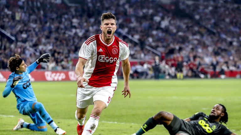 Ajax's forward Klaas Jan Huntelaar (C) celebrates his 1-0 goal against Standard Liege 