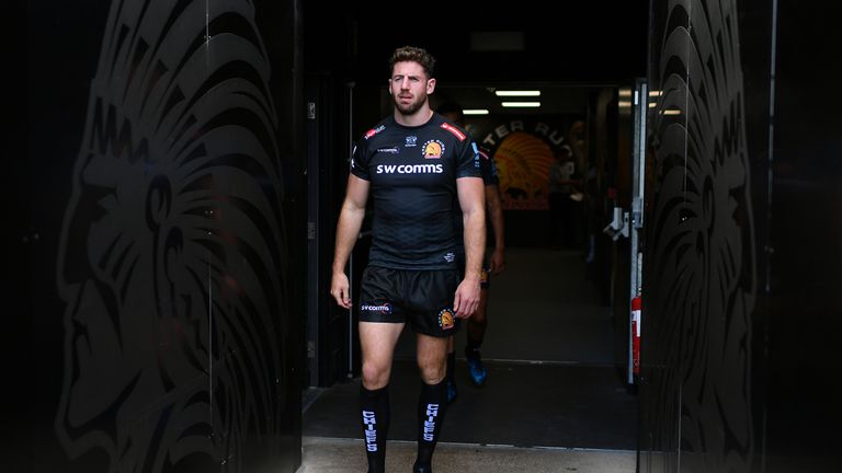 Alex Cuthbert makes his way out for the team photo during Exeter Chiefs' squad photo call