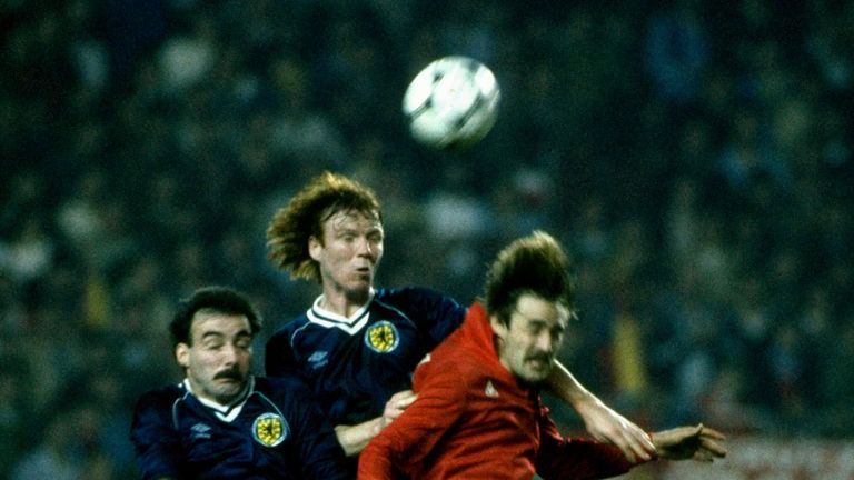 Alex McLeish rises above Willie Miller to head clear for Scotland against Spain