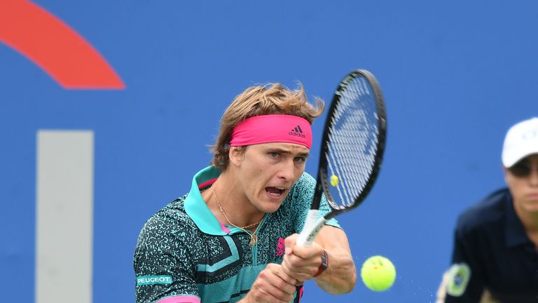 Alexander Zverev of Germany returns a backhand shot to Kei Nishikori of Japan during Day Seven of the Citi Open at the Rock Creek Tennis Center on August 3, 2018 in Washington, DC