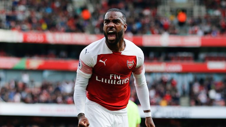 Alexandre Lacazette celebrates after his cross was turned in for an own goal by Issa Diop