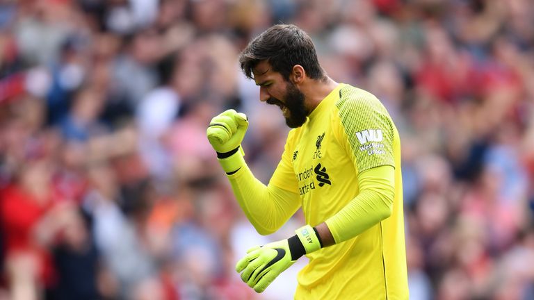 Alisson celebrates Liverpool's first goal 