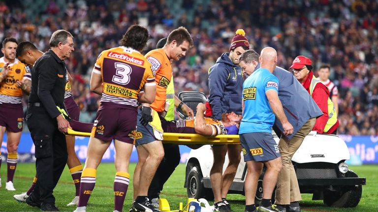 Andrew McCullough of the Broncos is stretchered from the field after a tackle from Dylan Napa of the Roosters during the round 24 NRL match between the Sydney Roosters and the Brisbane Broncos at Allianz Stadium on August 25, 2018 in Sydney, Australia.