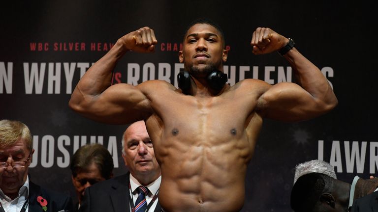  during a weigh-in prior to tomorrow's world heavyweight title fight between Anthony Joshua and Carlos Takam at Motorpount Arena on October 27, 2017 in Cardiff Wales.  (Photo by Stu Forster/Getty Images)