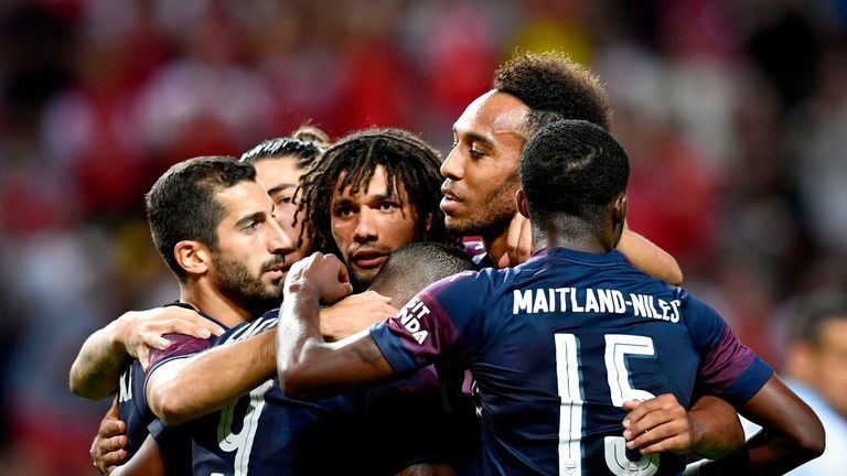 Pierre-Emerick Aubameyang celebrates with team-mates after scoring for Arsenal against Lazio
