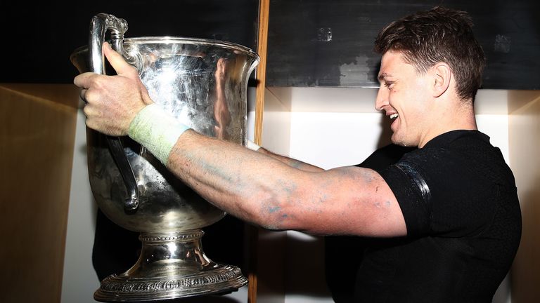 Beauden Barrett of the All Blacks drinks from the Bledisloe Cup in the dressing room after winning The Rugby Championship game between the New Zealand All Blacks and the Australia Wallabies at Eden Park on August 25, 2018 in Auckland, New Zealand.