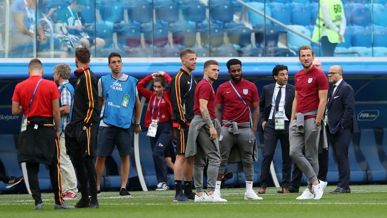 Belgium's Toby Alderweireld with Kieran Tripper, Danny Rose and Harry Kane of England on the pitch before the third place play-off match between Belgium and England at Saint Petersburg Stadium on July 14, 2018
