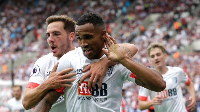 Callum Wilson of AFC Bournemouth celebrates after scoring his team's first goal with team-mate Dan Gosling during the Premier League match between West Ham United and AFC Bournemouth at London Stadium