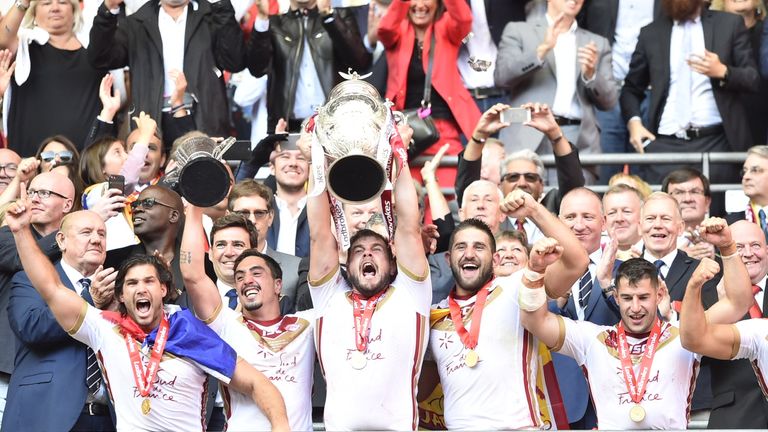 Catalans Dragons lift the Challenge Cup trophy