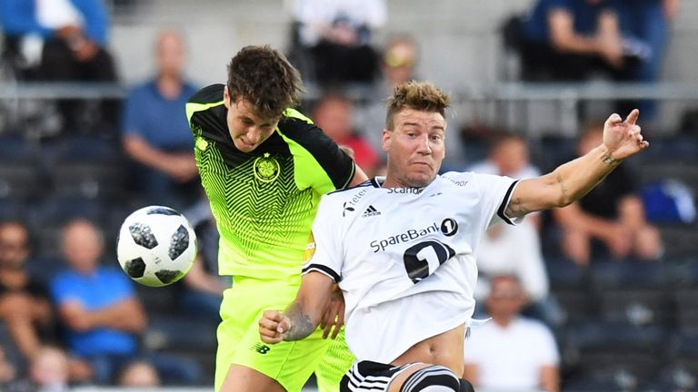 Celtic's Jack Hendry (left) and Nicklas Bendtner in action