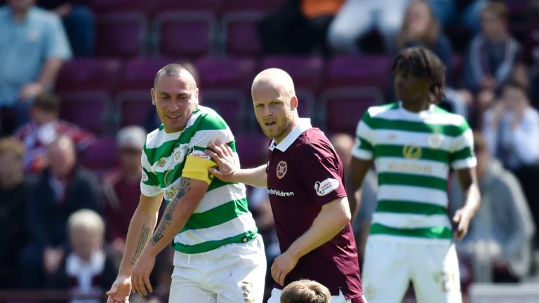 06/05/18 LADBROKES PREMIERSHIP.. HEARTS v CELTIC (1-3) .. TYNECASTLE PARK - EDINBURGH.. Celtic's Scott Brown (top) in action with Hearts' Harry Cochrane (below) and Steven Naismith.