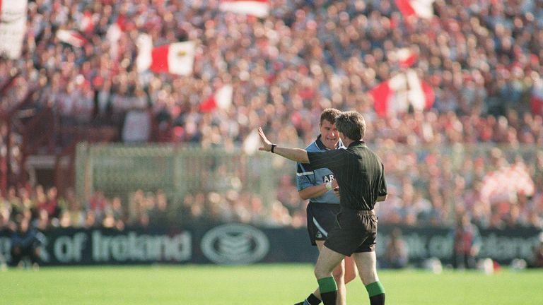 Referee Paddy Russell gives Charlie Redmond his marching orders