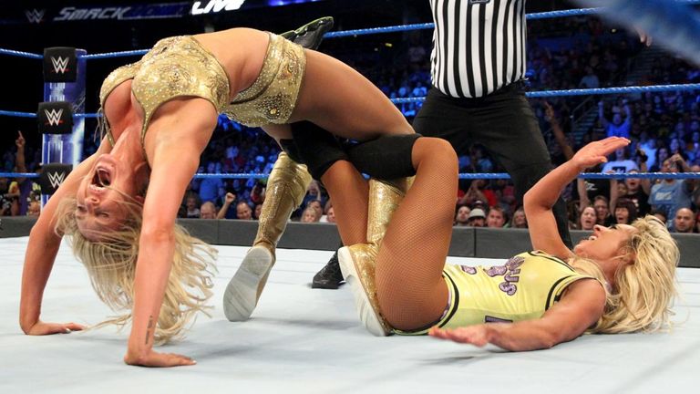 Charlotte Flair forced SmackDown women&#39;s champion Carmella to tap out to her Figure Eight leglock to earn a SummerSlam title match