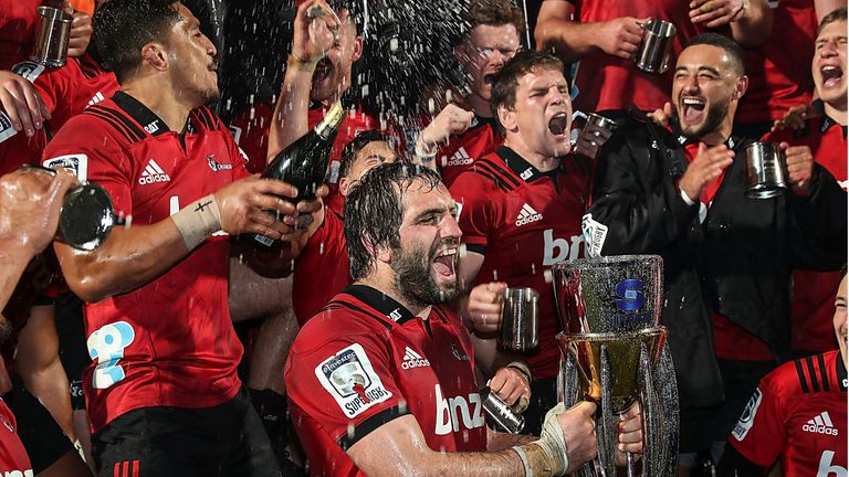 AUGUST 04: Crusaders team mates celebrate after winning the Super Rugby Final match between the Crusaders and the Lions at AMI Stadium on August 4, 2018 in Christchurch, New Zealand.