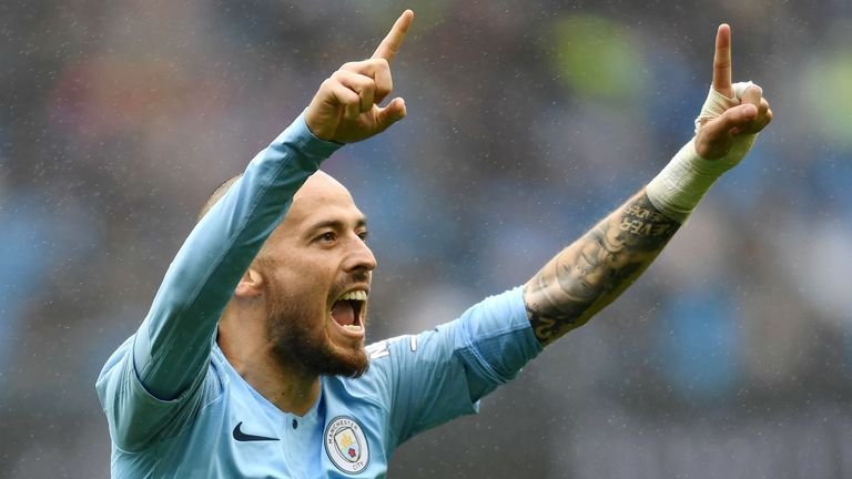 AUGUST 19: David Silva of Manchester City celebrates after scoring his team&#39;s fourth goal during the Premier League match between Manchester City and Huddersfield Town at Etihad Stadium on August 19, 2018 in Manchester, United Kingdom. 