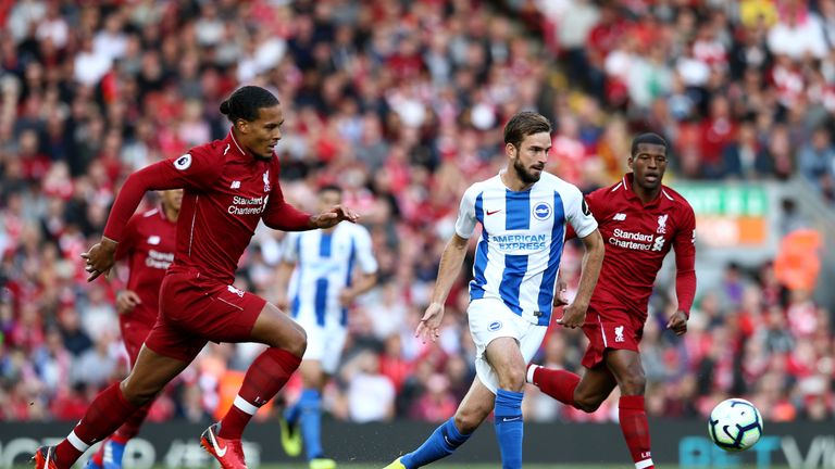 Davy Propper in action with Virgil Van Dijk and Georginio Wijnaldum at Anfield