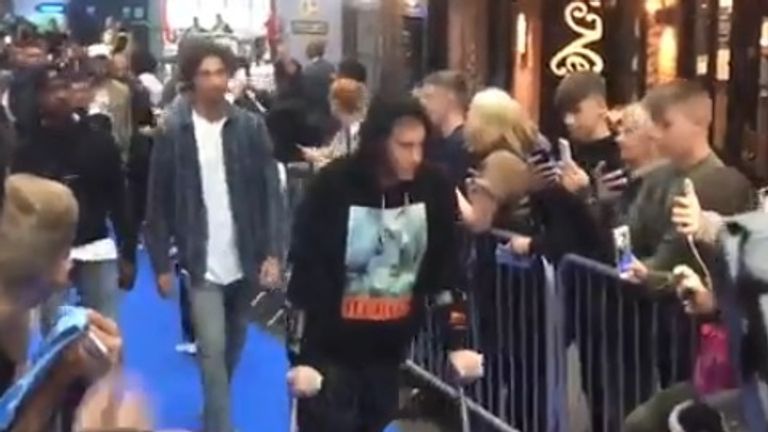 Kevin De Bruyne attended a film premiere in Manchester on crutches after suffering a knee injury in training.