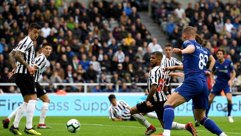 De Andre Yedlin turns the ball into his own net for Chelsea's second